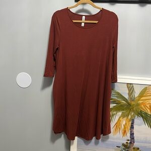 Pumpkin color trapeze flowy dress with pockets 3 quarter sleeves size medium
